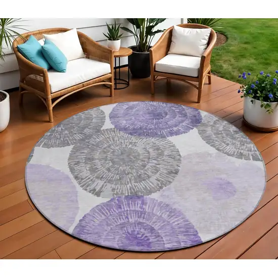 8' Plum Ivory And Khaki Round Abstract Washable Indoor Outdoor Area Rug Photo 1