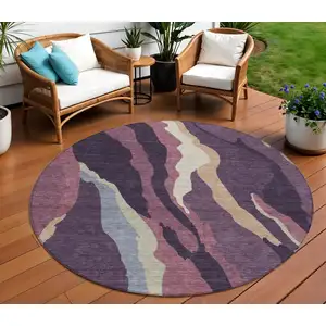 Photo of 8' Plum Purple And Ivory Round Abstract Washable Indoor Outdoor Area Rug