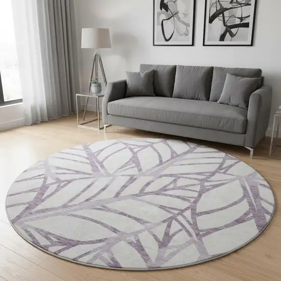 8' Purple And Beige Floral Washable Round Rug With UV Protection Photo 2