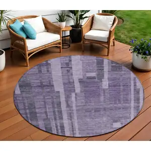 Photo of 8' Purple And Black Round Striped Washable Indoor Outdoor Area Rug