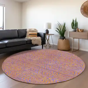 Photo of 8' Purple And Copper Round Abstract Washable Indoor Outdoor Area Rug