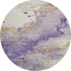 Photo of 8' Purple And Gold Abstract Washable Round Rug With UV Protection