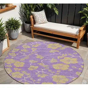 Photo of 8' Purple And Gold Round Floral Washable Indoor Outdoor Area Rug