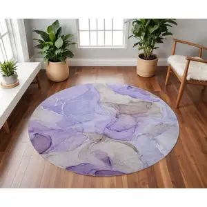 Photo of 8' Purple And Gray Abstract Washable Round Rug With UV Protection