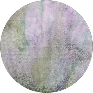 Photo of 8' Purple And Green Abstract Washable Round Rug With UV Protection