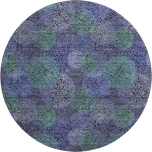Photo of 8' Purple And Green Abstract Washable Round Rug With UV Protection