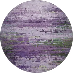 Photo of 8' Purple And Green Abstract Washable Round Rug With UV Protection