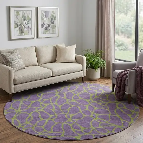 8' Purple And Green Geometric Washable Round Rug With UV Protection Photo 1
