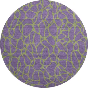 Photo of 8' Purple And Green Geometric Washable Round Rug With UV Protection