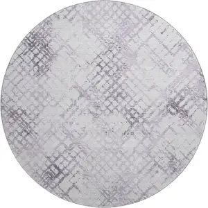 Photo of 8' Purple And Ivory Abstract Geometric Washable Round Rug With UV Protection