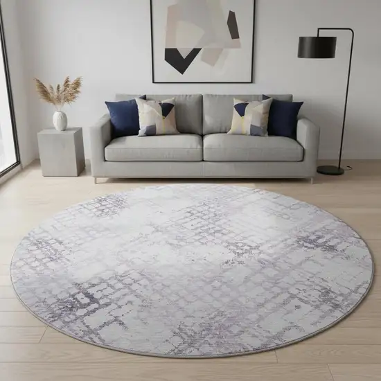 8' Purple And Ivory Abstract Geometric Washable Round Rug With UV Protection Photo 2