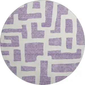 Photo of 8' Purple And Ivory Abstract Geometric Washable Round Rug With UV Protection