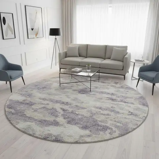 8' Purple And Ivory Abstract Washable Round Rug With UV Protection Photo 1