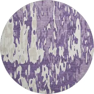 Photo of 8' Purple And Ivory Abstract Washable Round Rug With UV Protection