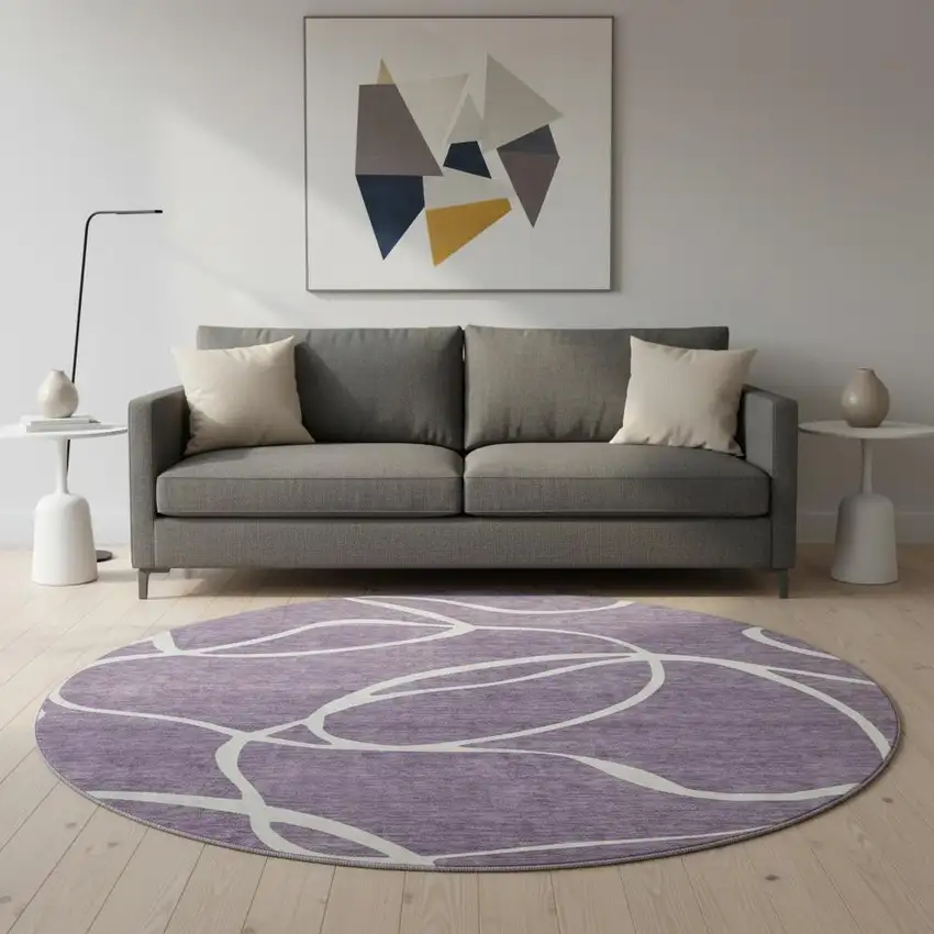 8' Purple And Ivory Abstract Washable Round Rug With UV Protection Photo 2