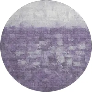 Photo of 8' Purple And Ivory Abstract Washable Round Rug With UV Protection