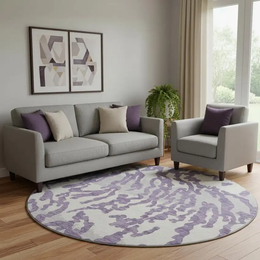 8' Purple And Ivory Animal Print Washable Round Rug With UV Protection Photo 1