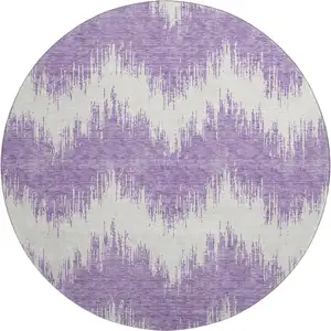 Photo of 8' Purple And Ivory Chevron Washable Round Rug With UV Protection
