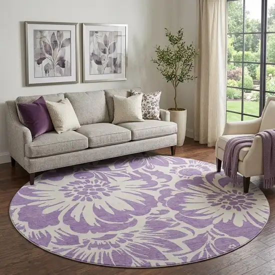 8' Purple And Ivory Floral Washable Round Rug With UV Protection Photo 1