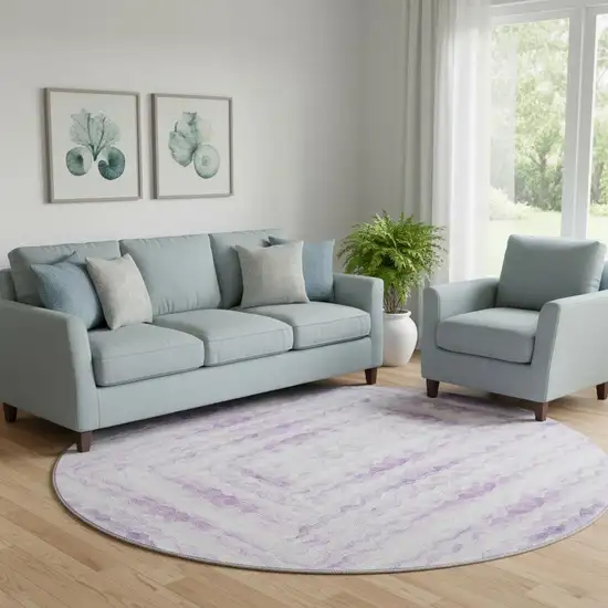 8' Purple And Ivory Geometric Washable Round Rug With UV Protection Photo 1