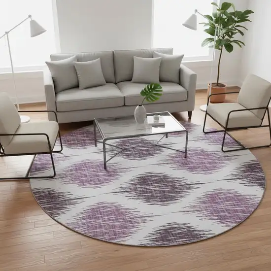 8' Purple And Ivory Ikat Washable Round Rug With UV Protection Photo 2