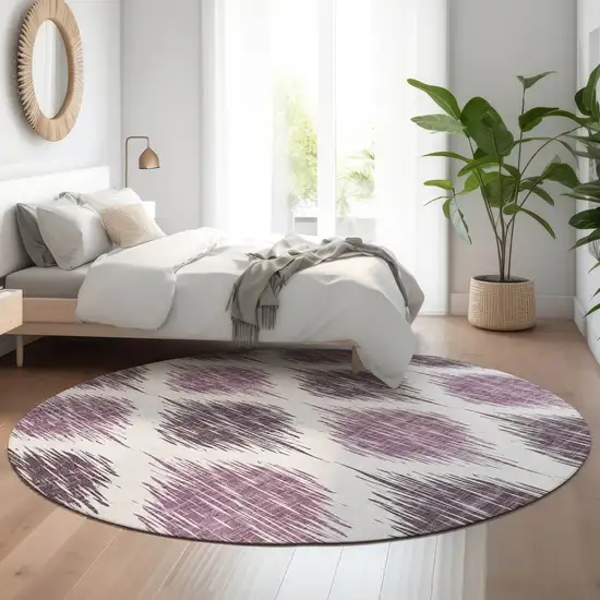 8' Purple And Ivory Ikat Washable Round Rug With UV Protection Photo 5