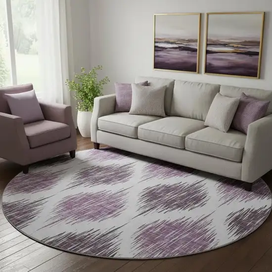 8' Purple And Ivory Ikat Washable Round Rug With UV Protection Photo 1