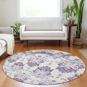 Photo of 8' Purple And Ivory Medallion Washable Round Rug With UV Protection