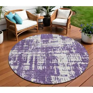 Photo of 8' Purple And Ivory Round Abstract Washable Indoor Outdoor Area Rug