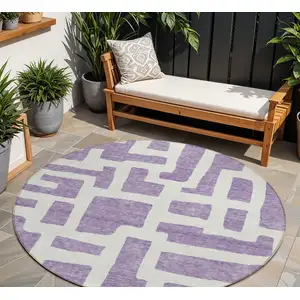 Photo of 8' Purple And Ivory Round Abstract Washable Indoor Outdoor Area Rug