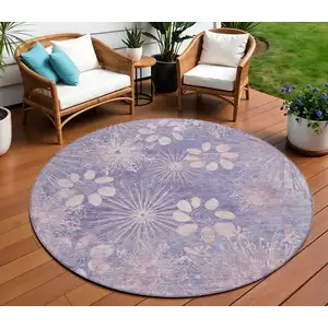 Photo of 8' Purple And Ivory Round Floral Washable Indoor Outdoor Area Rug