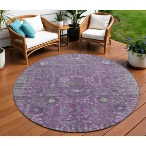 Photo of 8' Purple And Ivory Round Floral Washable Indoor Outdoor Area Rug