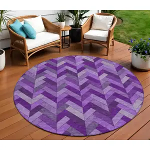 Photo of 8' Purple And Ivory Round Geometric Washable Indoor Outdoor Area Rug