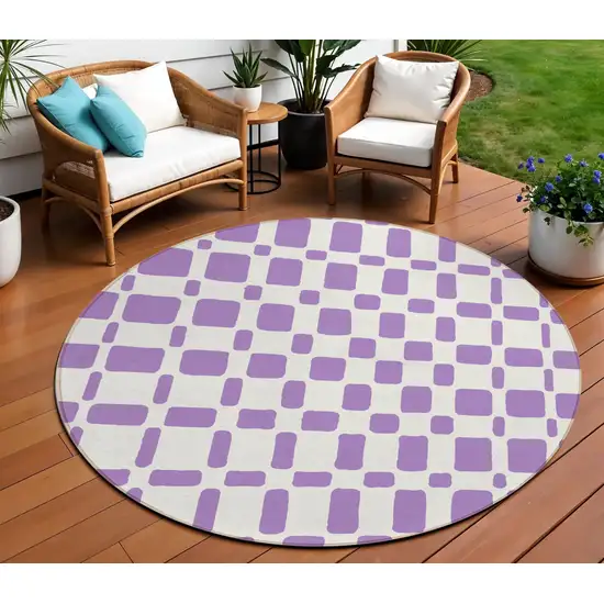 8' Purple And Ivory Round Geometric Washable Indoor Outdoor Area Rug Photo 1