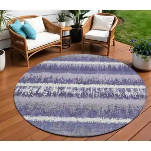 Photo of 8' Purple And Ivory Round Striped Washable Indoor Outdoor Area Rug