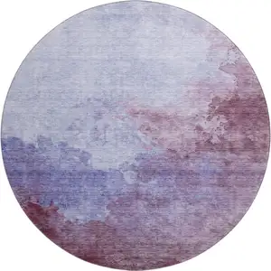 Photo of 8' Purple And Lavender Abstract Washable Round Rug With UV Protection