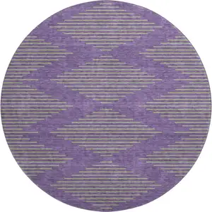 Photo of 8' Purple And Lime Green Geometric Washable Round Rug With UV Protection