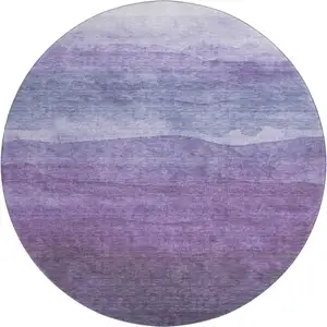 Photo of 8' Purple And Plum Striped Washable Round Rug With UV Protection