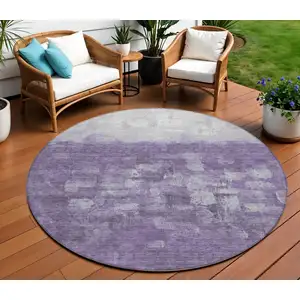 Photo of 8' Purple And Silver Round Abstract Washable Indoor Outdoor Area Rug