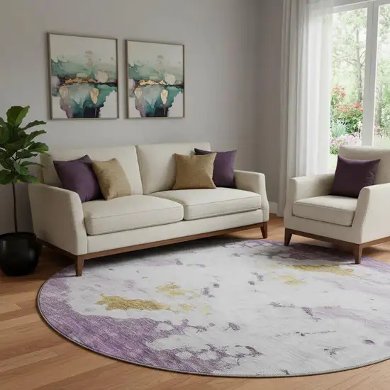 8' Purple Gold And Ivory Abstract Washable Round Rug With UV Protection Photo 1