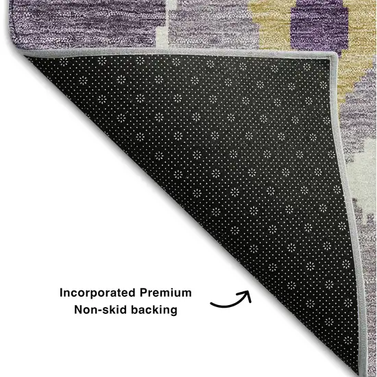 8' Purple Gold And Ivory Ikat Washable Round Rug With UV Protection Photo 5