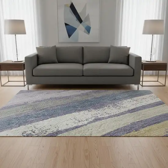 8' Purple Gold And Ivory Striped Washable Round Rug With UV Protection Photo 2