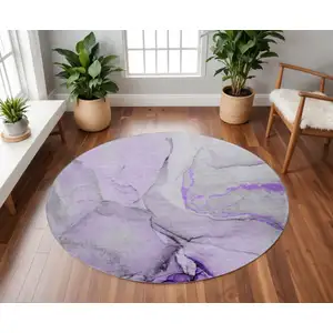 Photo of 8' Purple Gray And Ivory Abstract Washable Round Rug With UV Protection