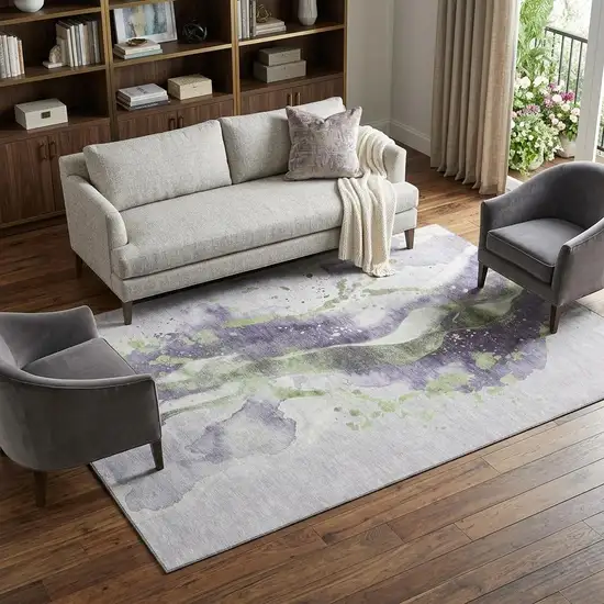 8' Purple Green And Ivory Abstract Washable Area Rug With UV Protection Photo 1