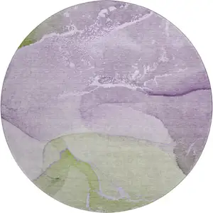 Photo of 8' Purple Green And Ivory Abstract Washable Round Rug With UV Protection