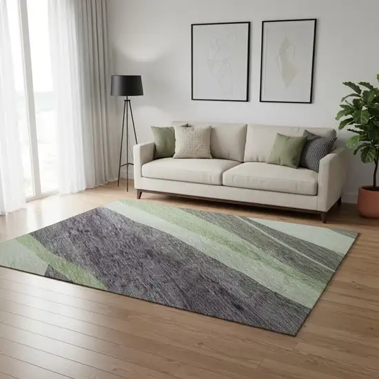 8' Purple Green And Ivory Abstract Washable Round Rug With UV Protection Photo 2