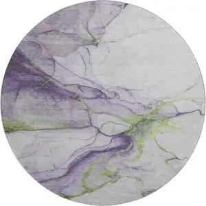 Photo of 8' Purple Green And Ivory Abstract Washable Round Rug With UV Protection