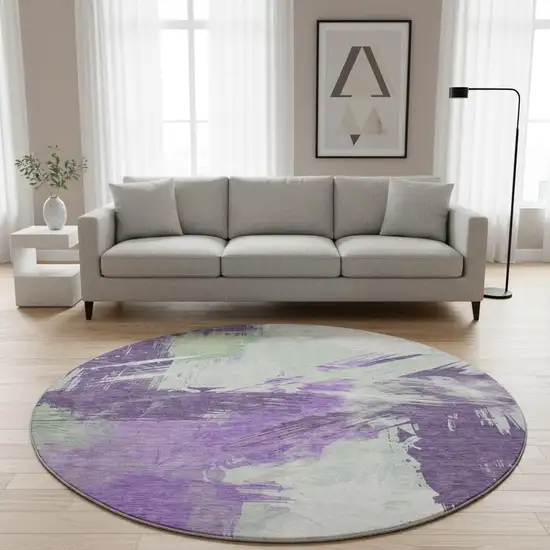 8' Purple Green And Ivory Abstract Washable Round Rug With UV Protection Photo 2