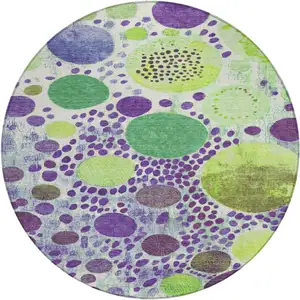 Photo of 8' Purple Green And Ivory Round Geometric Washable Indoor Outdoor Area Rug