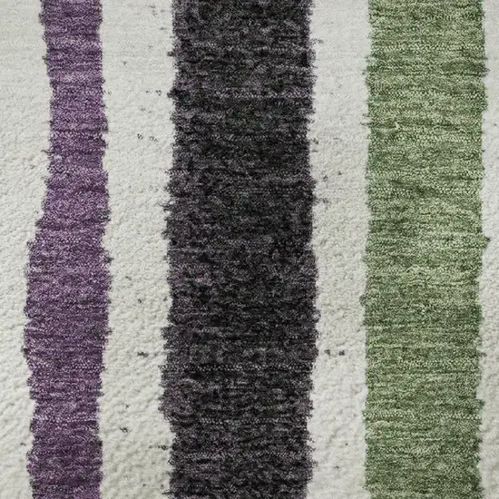 8' Purple Green And Ivory Striped Washable Round Rug With UV Protection Photo 8